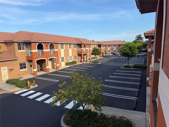 Building Photo - 18120 NW 59th Ave Unit 203