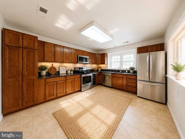 Building Photo - 10701 Kings Riding Way Unit 302-14