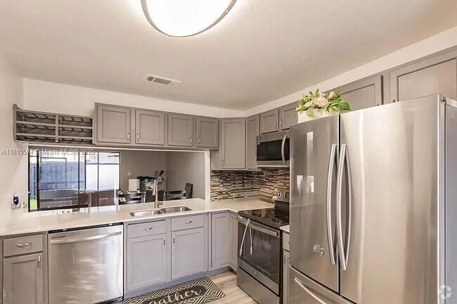 Building Photo - 4430 NW 92nd Way Unit 4430 Rental