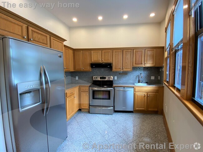 Building Photo - Huge, brand now reno - 2 full baths - Mass... Rental