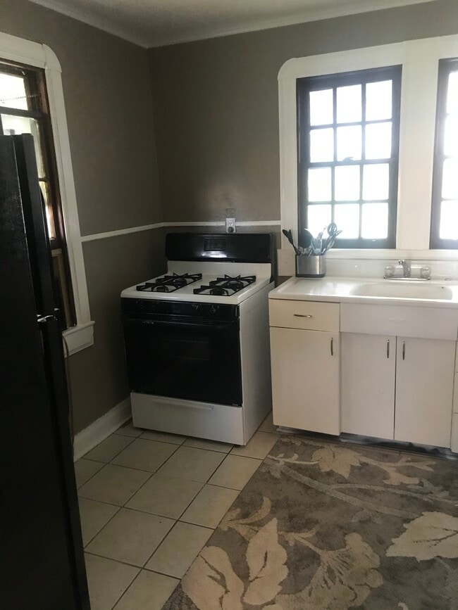 Kitchen pictured from living room - 704 Avenue G