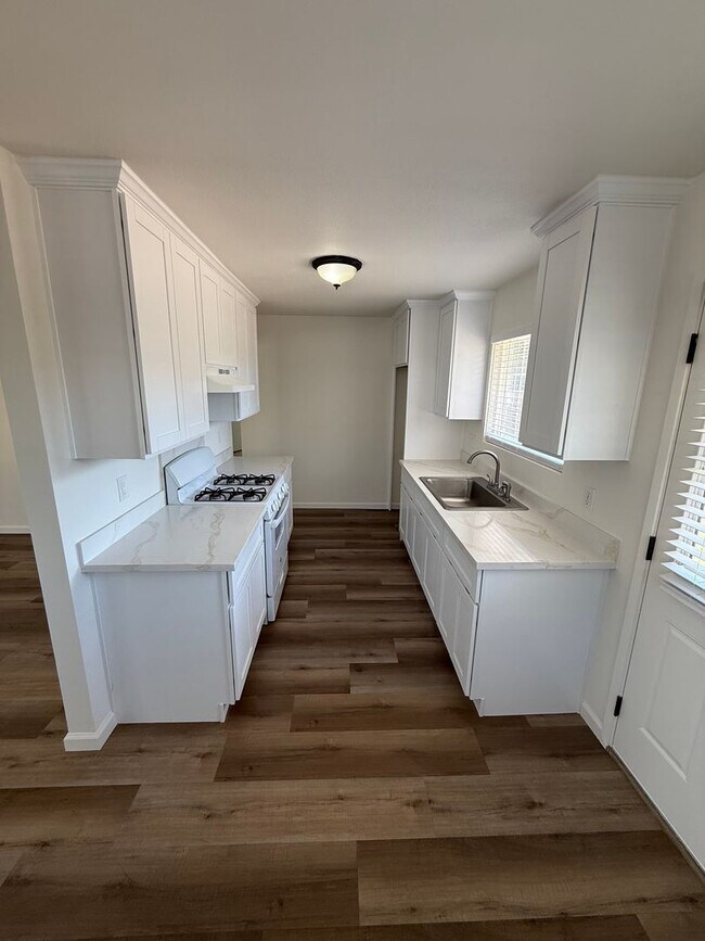 Photo - Updated Property with Large Front & Backyard