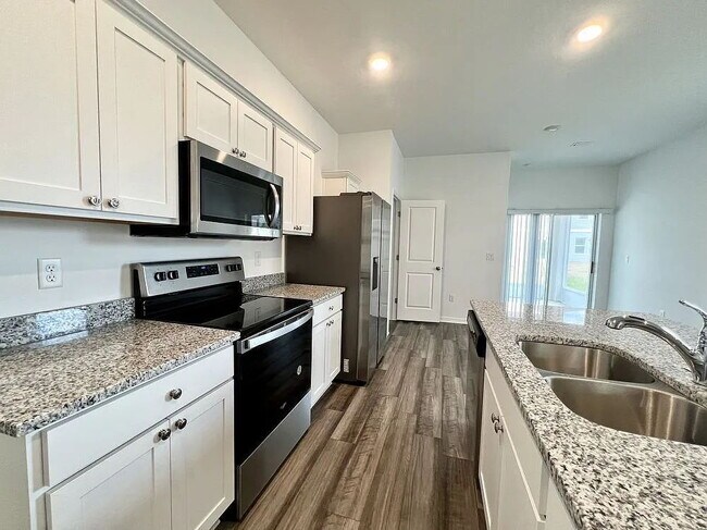 Photo - "Charming 3-Bed, 2-Bath Oasis in Zephyrhills – Your Perfect Retreat Awaits!"