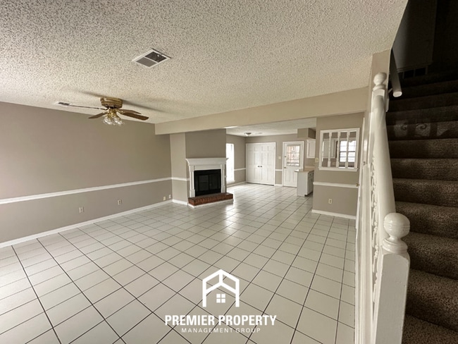 Photo - Charming 2BR/2.5BA Townhome | Dual Primary Suites, Fireplace & Fenced Yard