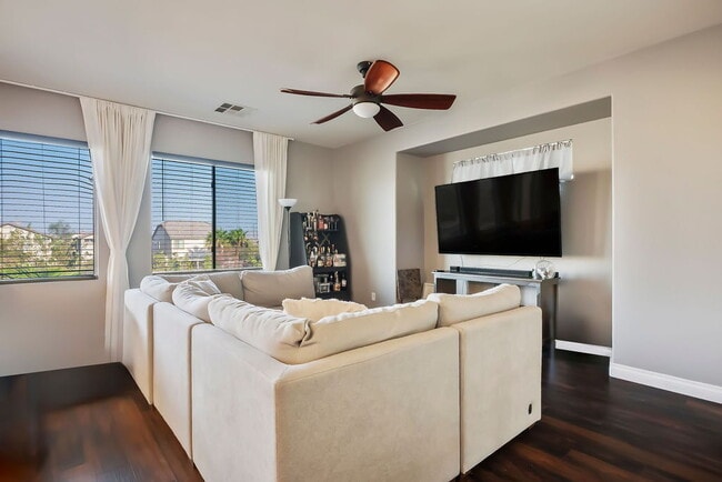 Photo - "Spacious 4-Bed Oasis with Outdoor Kitchen & Hardwood Elegance in North Las Vegas!"