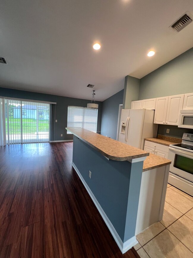 Photo - Charming 3-bedroom, 2-bath single-family home with a garage.