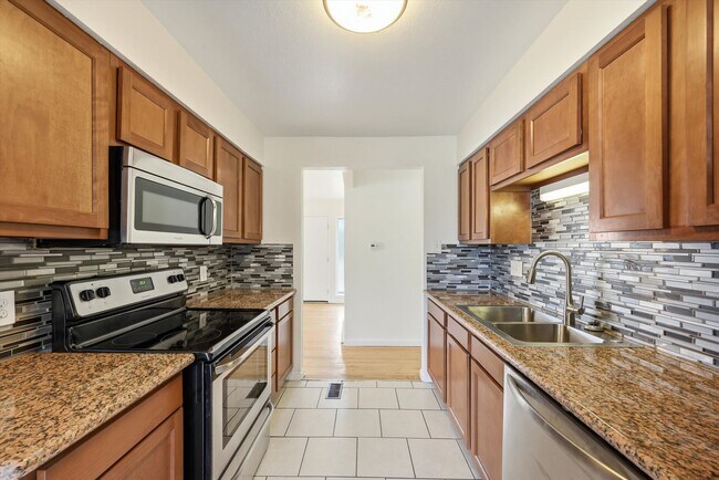 Photo - Spacious 3 Bedroom Home | 2 Bonus Rooms, Huge Yard & Detached 2-Car Garage