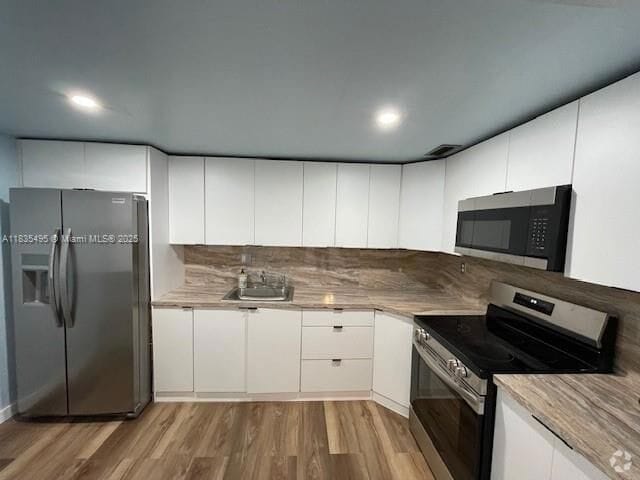 Building Photo - 1475 NE 125th Terrace Unit 614K Rental