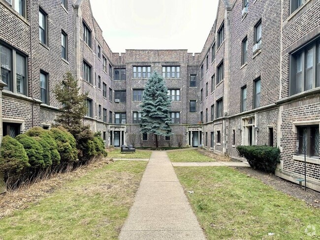 Building Photo - 1321.5 W Estes Ave Rental