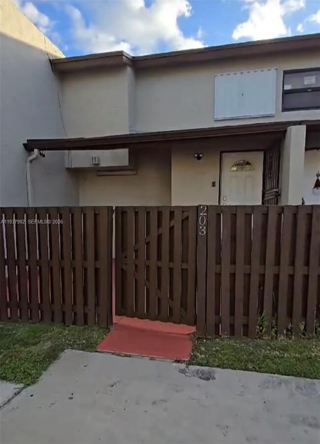 Building Photo - 10302 NW 9th St Cir Unit 203