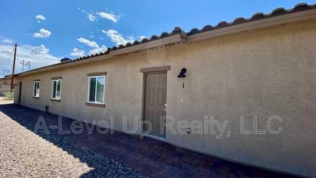 Building Photo - 1506 E 28th St Unit 1