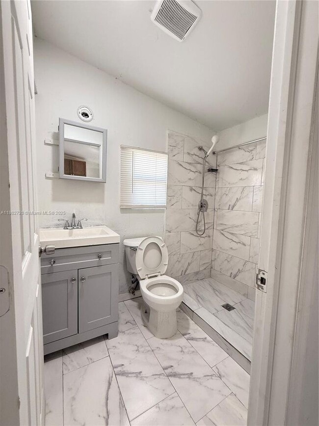 Building Photo - 2460 NW 61st St Unit C-C Rental