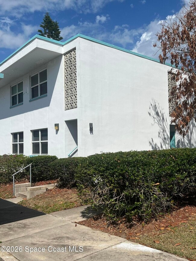 Building Photo - 8401 N Atlantic Ave Unit H4