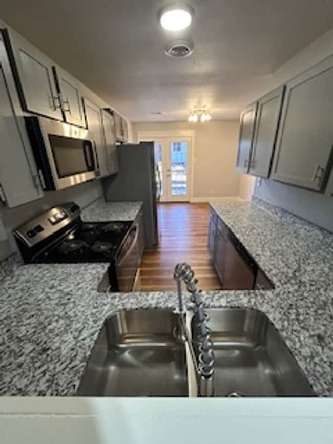 Photo - Updated Four Bedroom/Two Bath/Two Car Carport/Fenced/Storage Bldg