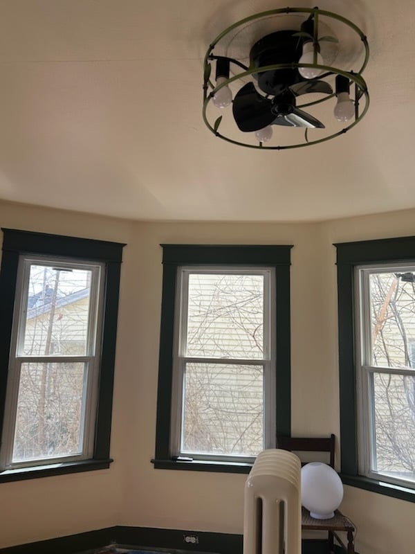 front room with incredible bay windows and darling fandelier! - 321 Odell Ave Unit 1
