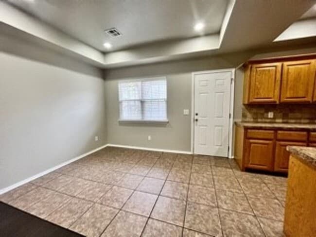 Photo - Spacious 3-Bed, 2.5-Bath Fourplex with Gar...