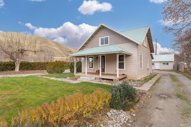 Photo - Charming 3-Bedroom, 1-Bathroom Home with Upstairs Bonus Area