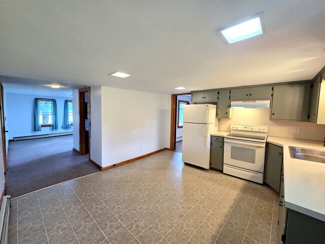 Kitchen looking into Living Room - 1 Lyonsville Rd Unit A