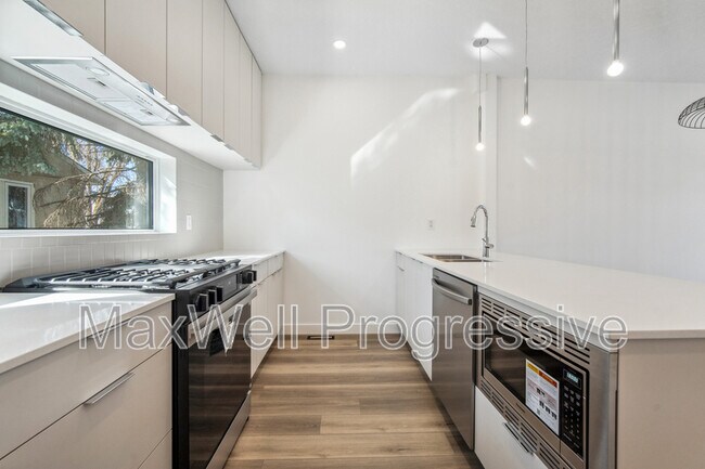 Photo - 9121-9165 65 Ave NW