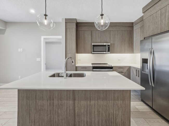 Photo - 63 Corner Glen Crois. NE Unit 1421