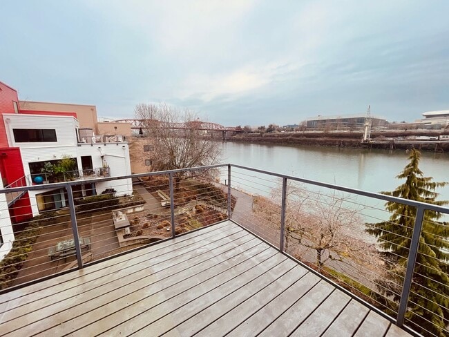 Building Photo - Top Floor 1bdrm Condo with River Views and Private Deck | Most Utilities & Parking Included! Unit D5