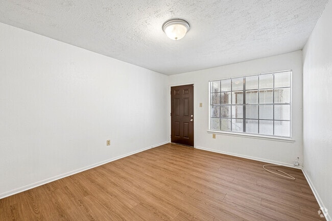 1BR, 1.5BA - 600SF - Living Room - Prosper Northgate