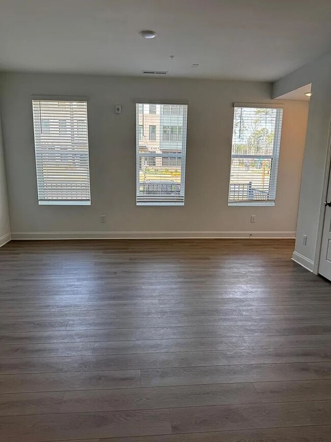 Photo - Stunning New Construction 3BD, 2.5BA Cary Townhome-Style Condo with a 1-Car Garage in a Prime Loc...
