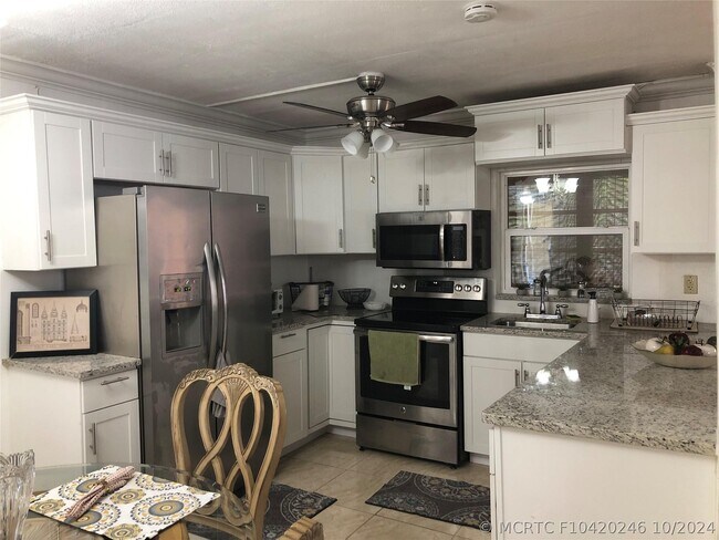 9091 Lime Bay Blvd Unidad 203