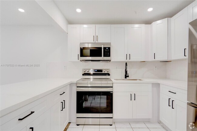 Building Photo - 6095 W 19th Ave Unit 220 Rental