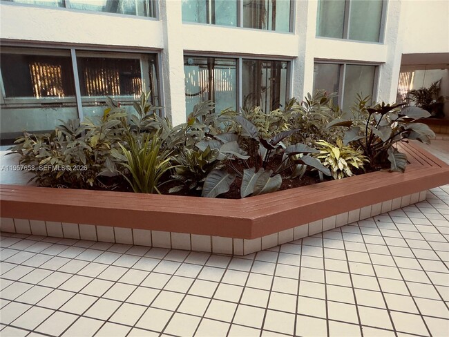 Building Photo - 11800 SW 18th St Unit 322-4