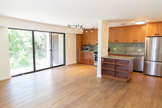 Sliding glass doors on to balcony, with dining area - 511 1st St N Unit 314