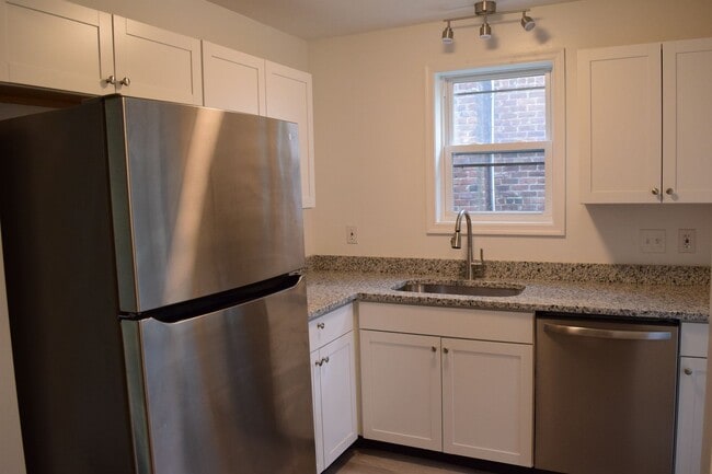 Photo - Charming Northside Two-Story Brick Home With 2 car garage and basement