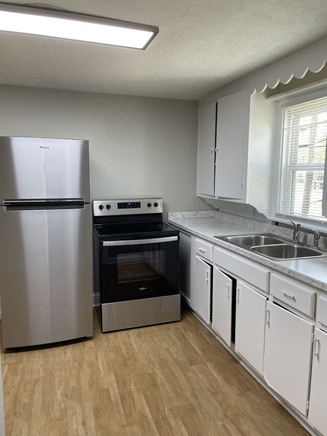 Photo - 4 Bedroom Two-Story Home with Large Yard, Lawn Care Included