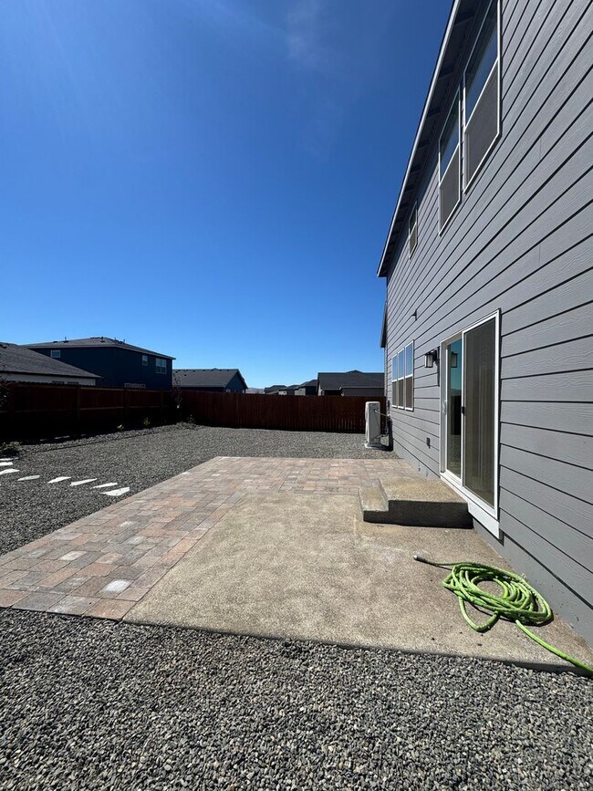 Photo - 4-Bedroom Home with Low-Maintenance Landscaping