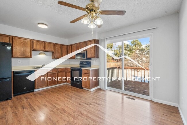 Photo - Spacious Split-Level Home in D20 with Mountain Views, 2 Car Garage, Fenced Yard and AC!