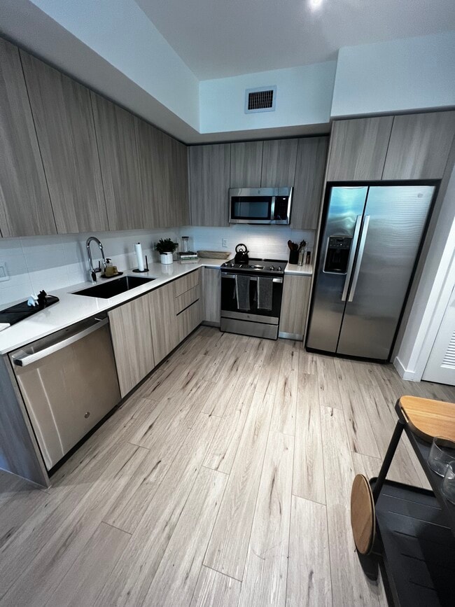 Building Photo - 7082 W 4th Ct Unit A1 Rental