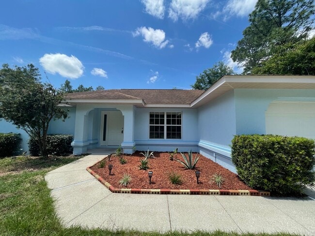 Photo - 3 Bedroom 2 bath 2 Car Garage situated on a large Corner Lot in SW Ocala