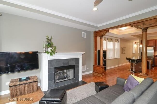 Photo - 2-Bed, 2-Bath Urban Retreat with Fireplace & Hardwood Floors Unit 2
