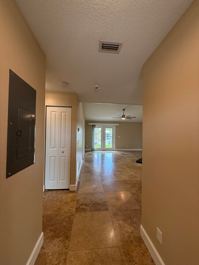 First inside view from the front door. Notice the French Doors in the Great-room . - 928 NW Spruce Ridge Dr