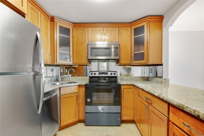 Building Photo - 13120 SW 92nd Ave Unit B-409