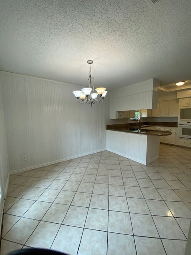 Photo - Come and view this open floor plan with much potential. Formal and dining room, granite counters,...