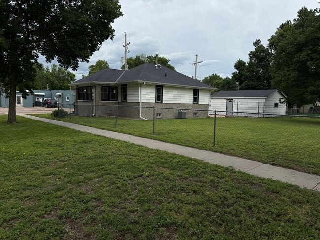 Photo - Charming 2-Bedroom Home with Spacious Backyard and 2-Car Garage