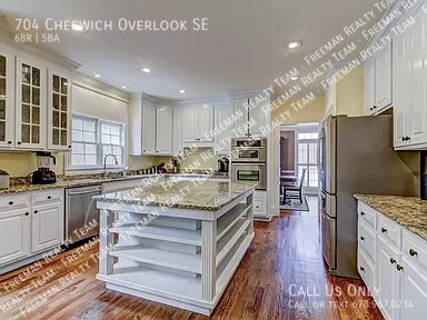 Photo - 704 Cheswich Overlook SE