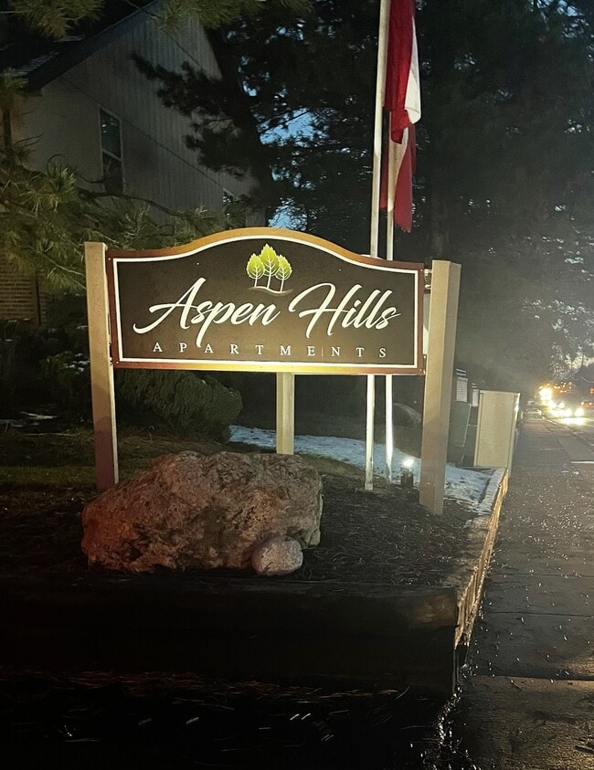 Aspen Hills entrance - Aspen Hills Apartments