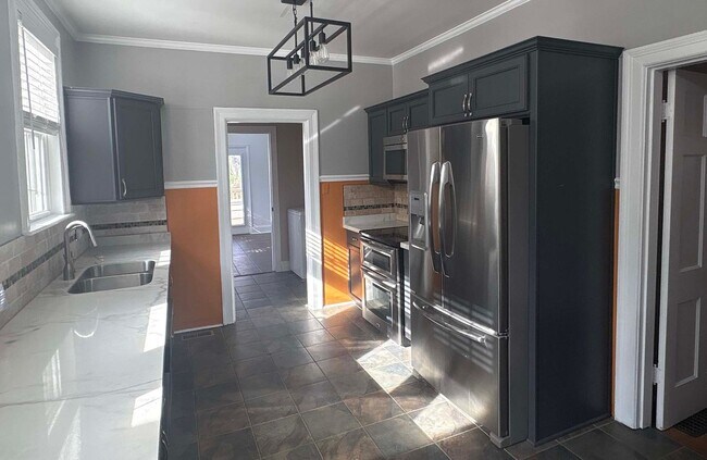 Photo - 5BR/2.5 Bath in Prime 12 South | Park-Facing | Two Sunrooms | Walkable Luxury Living