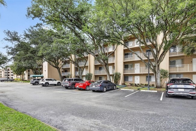 Building Photo - 9470 Tangerine Pl Unit 105