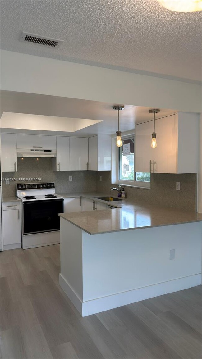 Building Photo - 11163 NW 7th St Unit 201-19