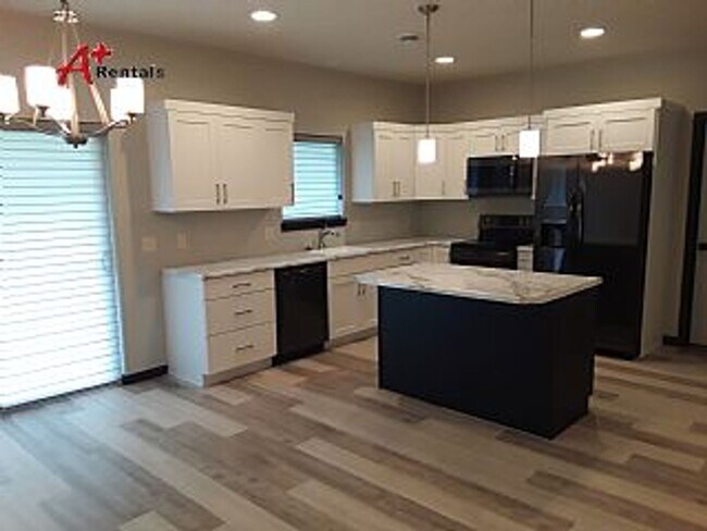 Photo - Three bedroom two bathroom Twin home w/ triple garage