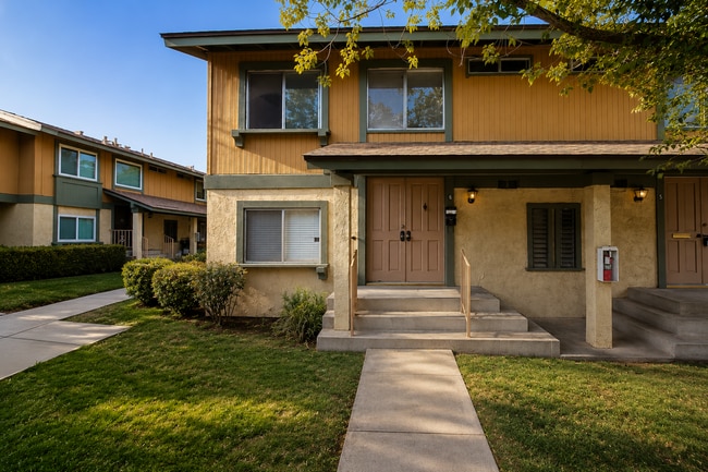 Building Photo - Fully Renovated 3 Bed Townhome with Large Enclosed Patio + 2-Car Garage