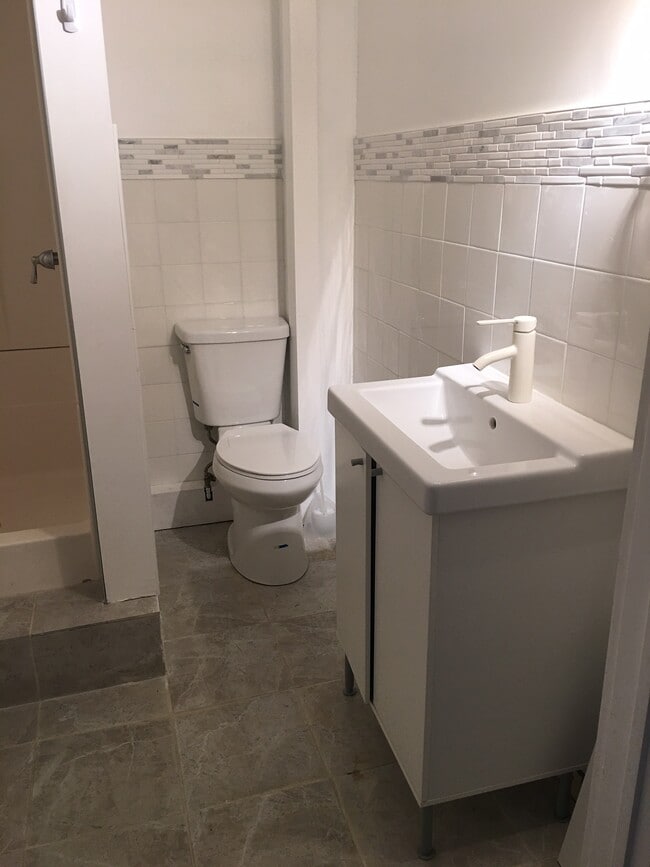 Building Photo - Johnson Village Apartments, LLC Unit 1